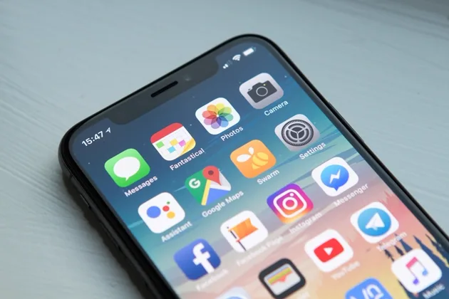 Person using a smartphone for phone number research